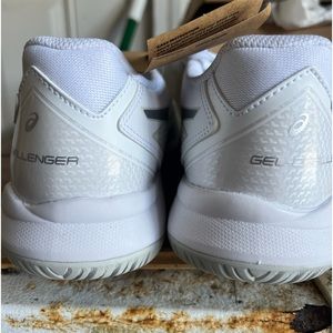 Brand new with tags white ASICS, size 7.5